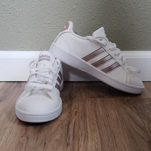 White with pink Adidas. Never worn!
